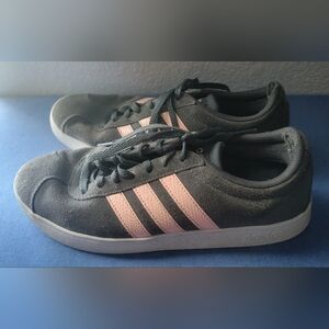Womens size 7.5 pre owned dark gray and pink adidas sneakers.